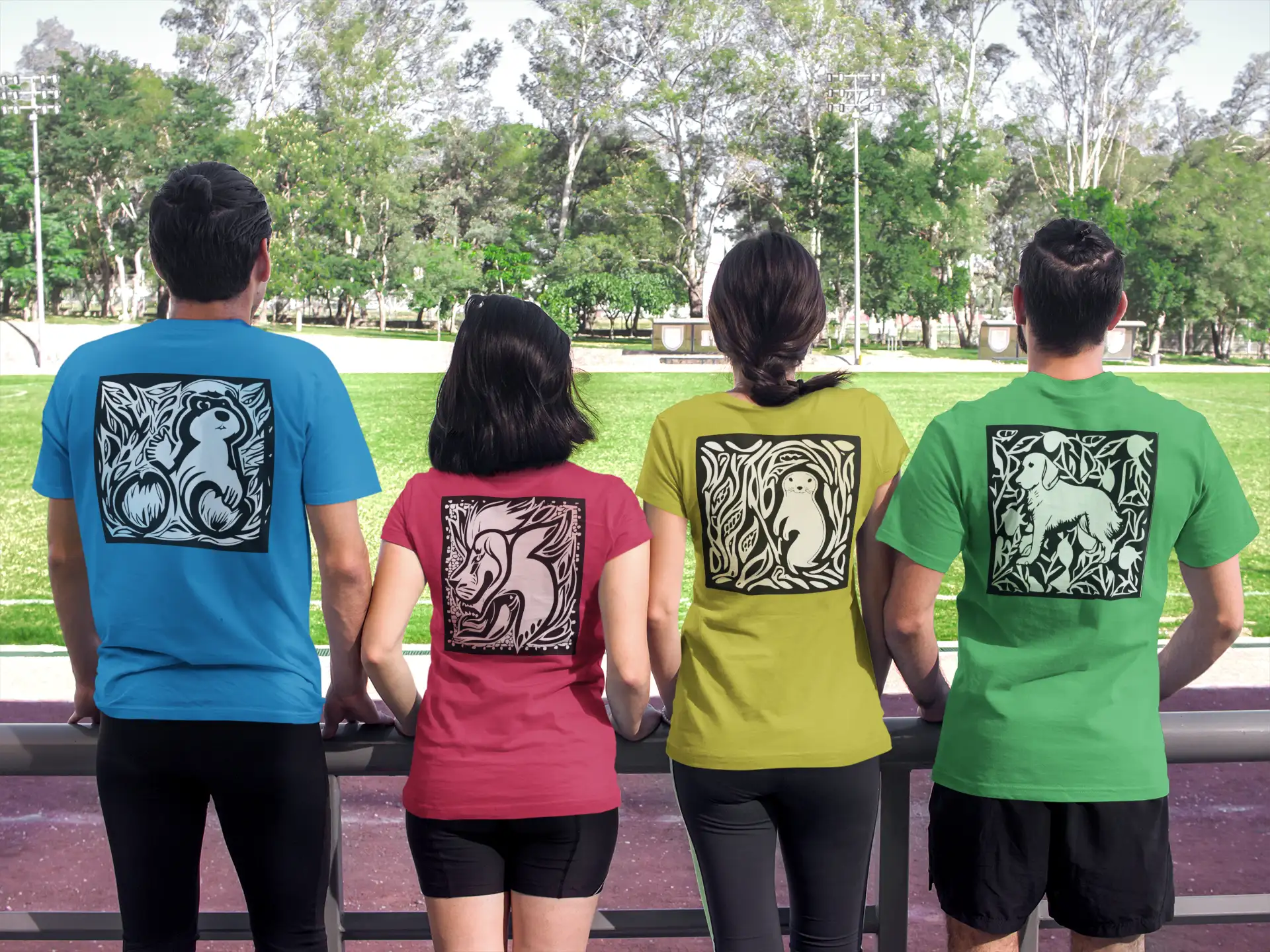 Four people wear short-sleeved t-shirts with distinct colored backgrounds—blue, red, yellow-green, and green—and each features a square black-and-white cut-out design of an animal or creature on the back.