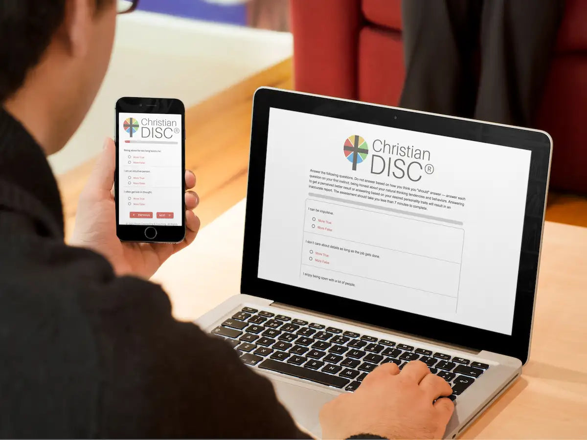 Silver laptop displaying christian disc assessment interface